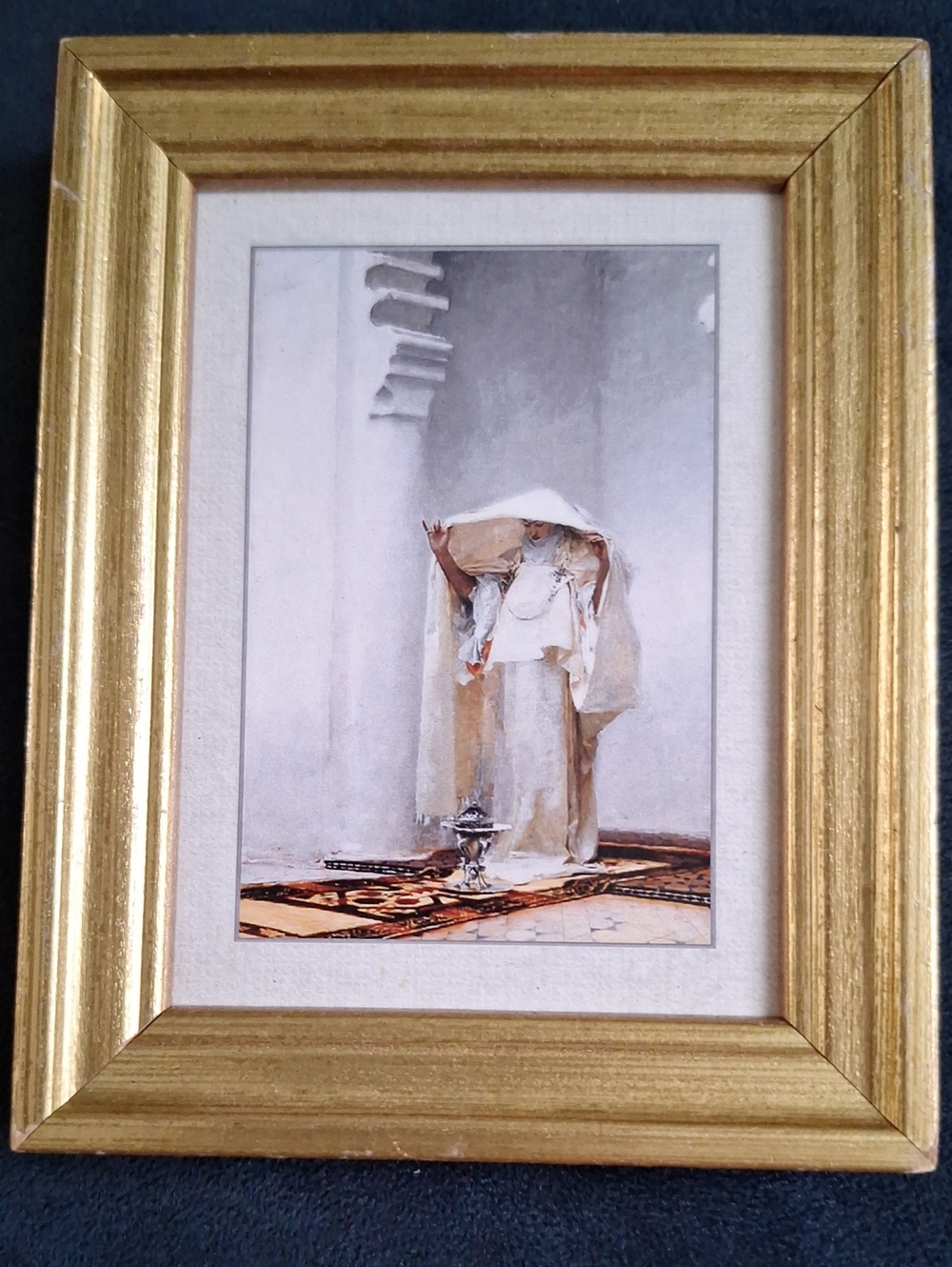 framed print of John Singer Sargent’s 1880 painting Fumée d'Ambre Gris